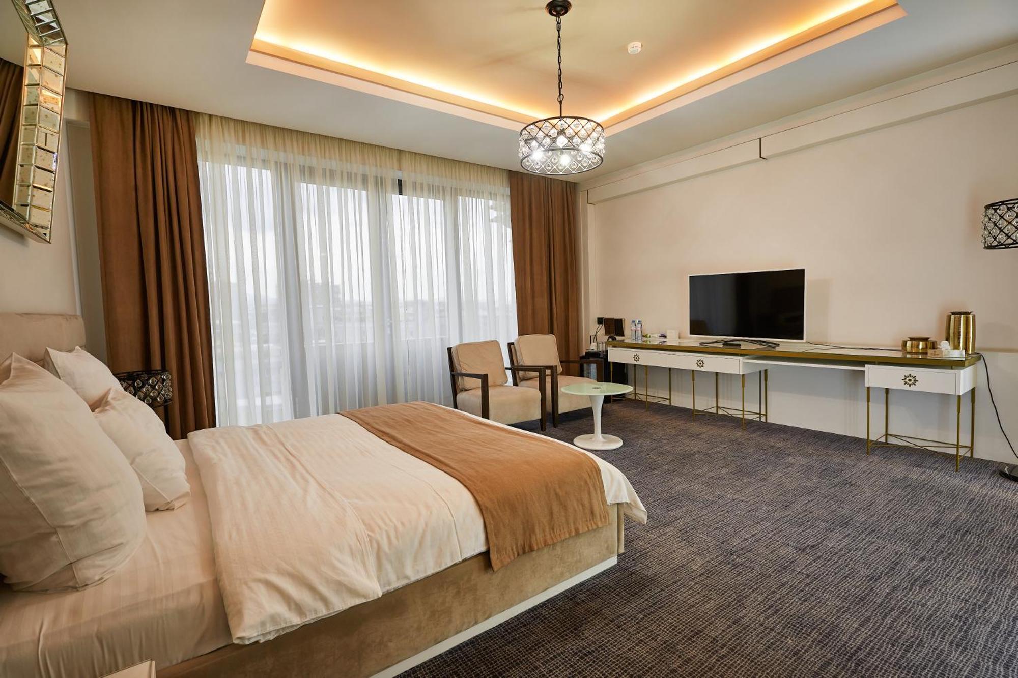 アガバビアンズ ホテル エレバン エクステリア 写真 A bedroom at the hotel